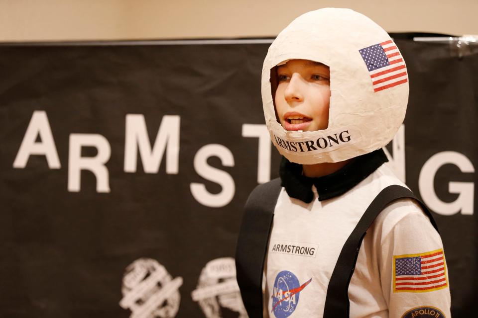 Here's an example of a DIY Neil Armstrong costume. Of course, you can always play it safe and get a pre-made astronaut costume and a name tag that says, "Neil Armstrong."