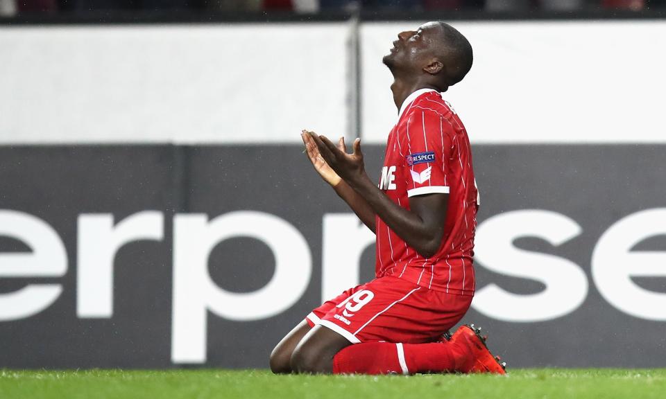 Sehrou Guirassy celebrates scoring Cologne’s winner from the penalty spot, in their Europa League match against Arsenal.