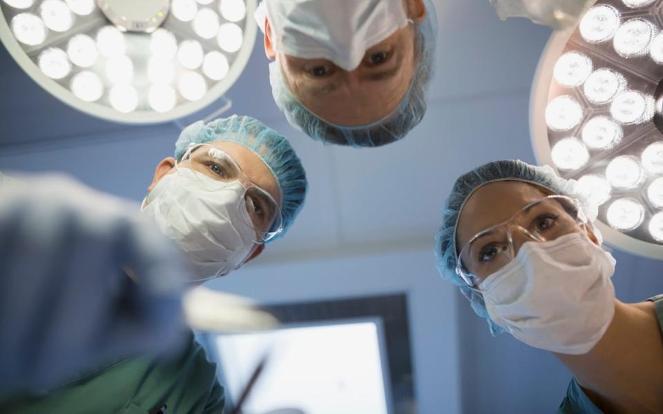 Keyhole surgery, where an operation is carried out through a small hole in the patient’s body, has become increasingly common because it helps patients recover more quickly - Getty Images Contributor