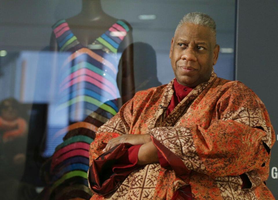 Andre Leon Talley, a former editor at large for Vogue magazine, speaks to a reporter at the opening of the "Black Fashion Designers" exhibit at the Fashion Institute of Technology in New York on Dec. 6, 2016. Talley, the towering former creative director and editor at large of Vogue magazine, has died. He was 73. Talley's literary agent confirmed Talley's death to USA Today late Jan. 18.