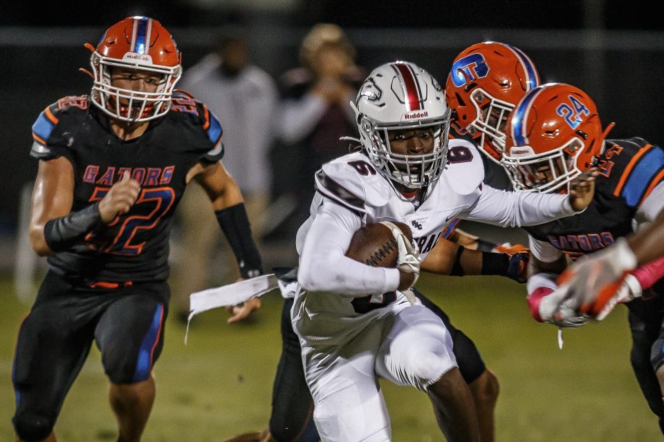Second half action of Florida High School Athletic Association boys football action between the host Palm Beach Central High School Broncos and the Palm Beach Gardens Community High School Gators in Wellington, Fla., on October 21, 2022.