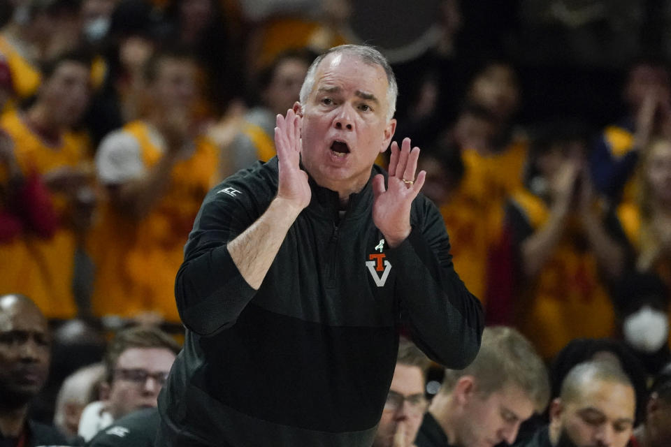 Virginia Tech head coach Mike Young talks to his team during the second half of an NCAA college basketball game against Maryland, Wednesday, Dec. 1, 2021, in College Park, Md. Virginia Tech won 62-58. (AP Photo/Julio Cortez)