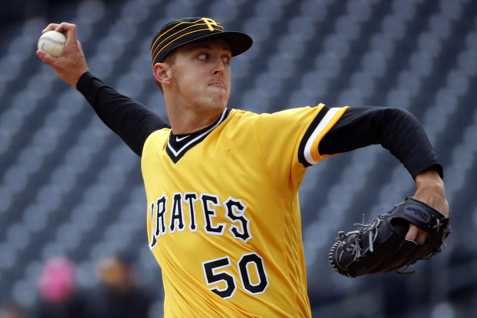 Pittsburgh Pirates starter Jameson Taillon was dealing against the Reds on Sunday. (AP Photo/Gene J. Puskar)