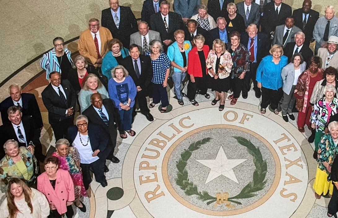 Members of the Texas Silver-Haired Legislature pose for a picture at the Texas State Capitol in 2021.