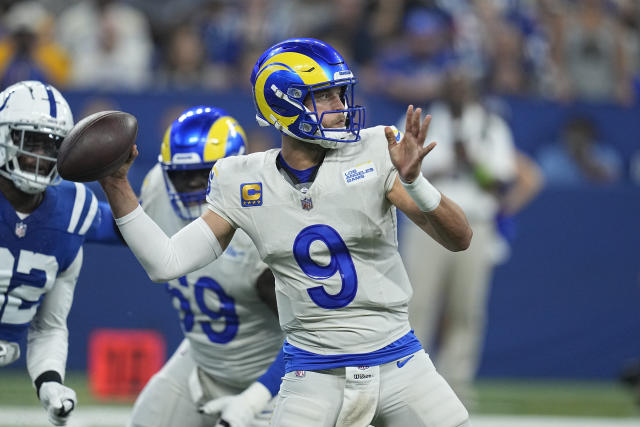 Los Angeles Rams quarterback Matthew Stafford (9) rthrows on the run during  an NFL football gam …