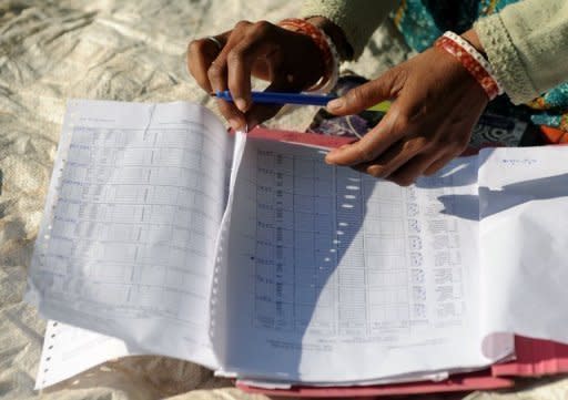 A microfinance loan officer calculates money received from borrowers on January 2011. Bangladesh's Supreme Court on Tuesday dismissed Nobel-winning Muhammad Yunus's final appeal against a central bank order sacking him from the microfinance bank he founded, Yunus's lawyer told AFP