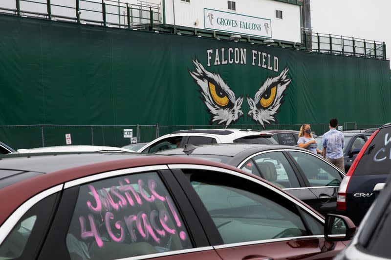 Students protest outside Groves High School in support of a fellow student who was jailed in a Detroit suburb