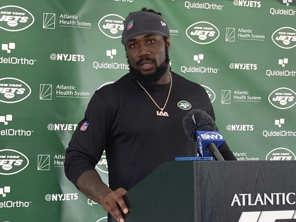 New York Jets running back Dalvin Cook speaks to reporters at the team's facility in Florham Park, N.J., on Thursday, Aug. 17, 2023. The former Minnesota Vikings star signed a one-year contract with the Jets on Aug. 16. (AP Photo/Dennis Waszak Jr.)