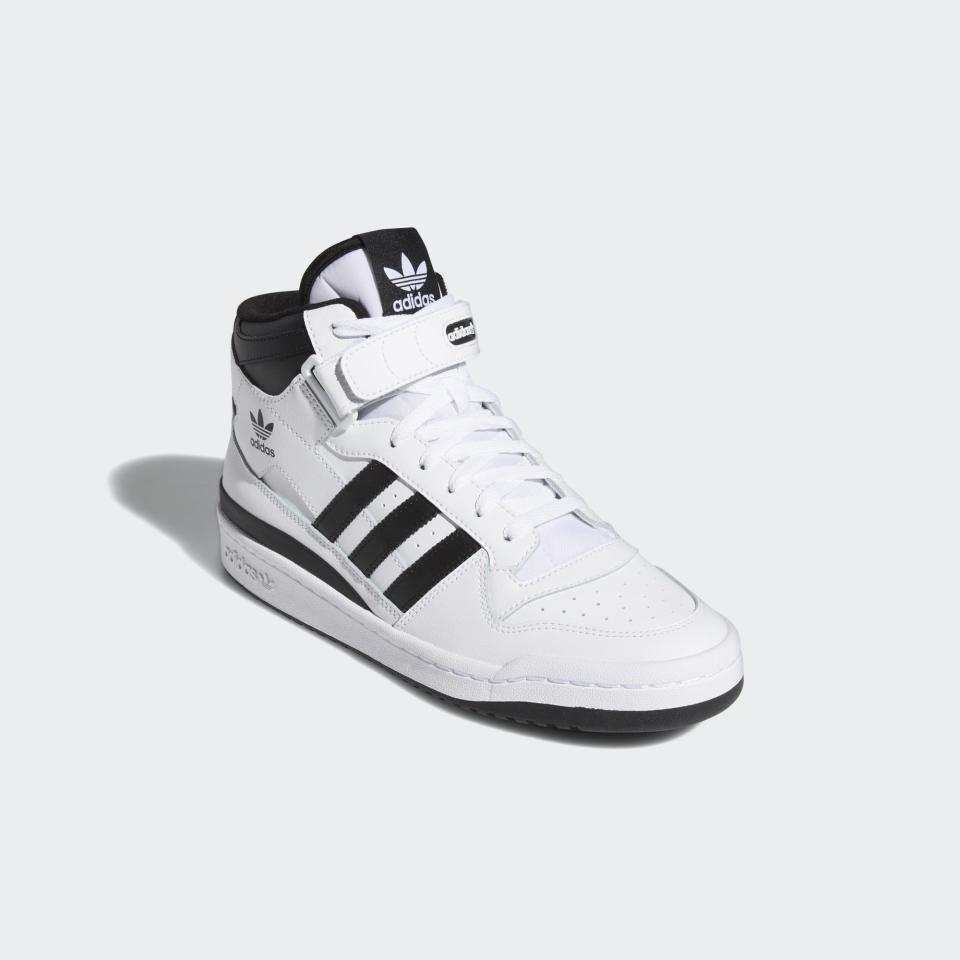 <p><strong>Adidas</strong></p><p>adidas.com</p><p><strong>$100.00</strong></p><p><a href="https://go.redirectingat.com?id=74968X1596630&url=https%3A%2F%2Fwww.adidas.com%2Fus%2Fforum-mid-shoes%2FFY7939.html&sref=https%3A%2F%2Fwww.townandcountrymag.com%2Fsociety%2Ftradition%2Fg37681411%2Fprincess-diana-sweatshirt-biker-shorts-outfit-inspiration%2F" rel="nofollow noopener" target="_blank" data-ylk="slk:Shop Now;elm:context_link;itc:0;sec:content-canvas" class="link ">Shop Now</a></p><p>Diana's high top sneakers may appear all white, but they actually have a few black accents. These Adidas mid-rise sneakers are a similar style. </p>