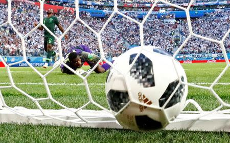 Soccer Football - World Cup - Group D - Nigeria vs Argentina - Saint Petersburg Stadium, Saint Petersburg, Russia - June 26, 2018 The ball hits the back of the net as Argentina's Lionel Messi scores their first goal REUTERS/Henry Romero