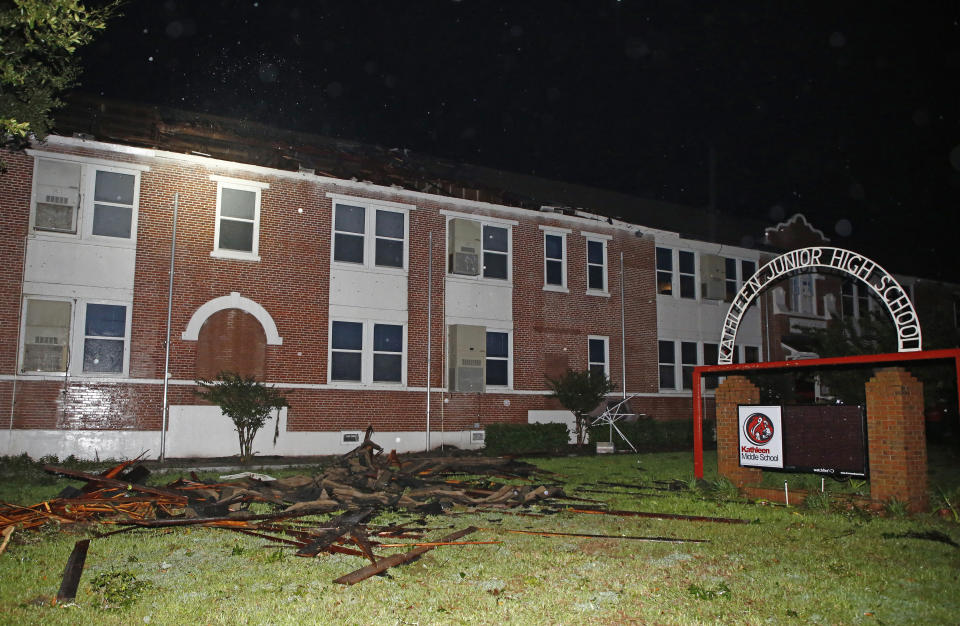 Major damage to the roof of Kathleen Middle School as a tornado ripped across Polk county due to a squall line from Tropical Storm Nestor on Saturday, Oct. 19, 2019 in Kathleen, Fla. Nestor was downgraded Saturday after it spawned a tornado that damaged several homes. (Luis Santana/Tampa Bay Times via AP)