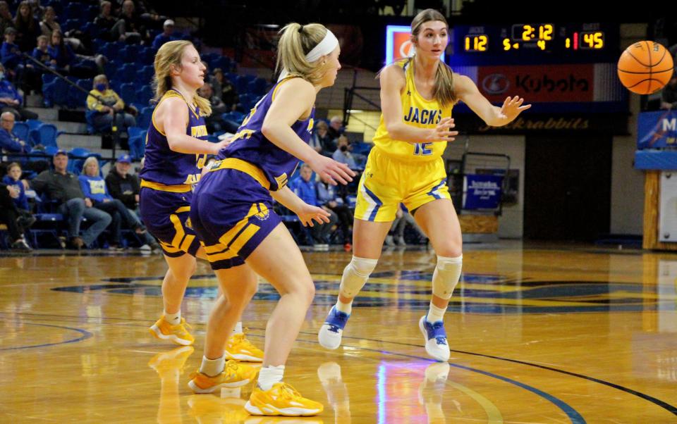 SDSU's Regan Nesheim makes a pass during Saturday's win over Western Illinois at Frost Arena.
