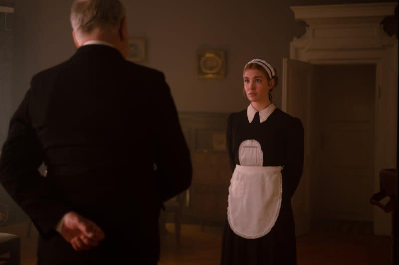Irena Gut Opdkye (Sophie Nélisse) serves as a maid in a house commandeered by the Germans. Photo courtesy of Quiver Distribution