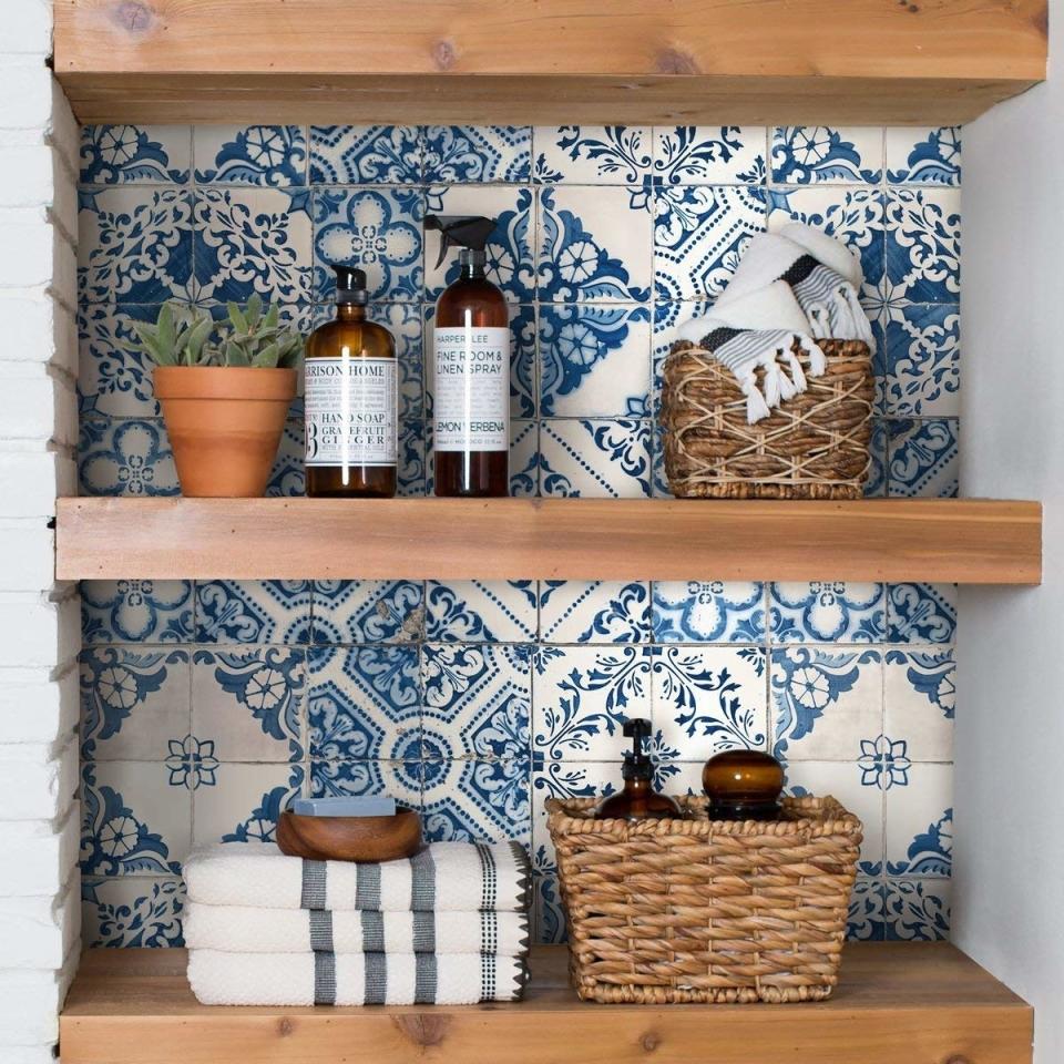 This wallpaper is such an easy way to brighten up your home with a marvelous, Mediterranean tile touch.<br /><br /><strong>Promising review:</strong> "I am IN LOVE. I bought this to use as a backsplash in my rented studio apartment kitchen, which has potential to be pretty but really needs some help. I ordered two rolls thinking that if I liked it in my kitchen, I&rsquo;d order more to use on the wall behind my bar cart. I loved it so much when it came in that I decided to go ahead and put it up on the big wall and deal with the kitchen later. <strong>The pattern is so easy to line up and it looks so good! My tiny, dark apartment instantly looked bigger and brighter.</strong> Even up close I can&rsquo;t tell where the seams are. It was super easy to put up by myself, though I would recommend having another person to help if possible because it would have taken a lot less time if I&rsquo;d had someone to hold it steady while I lined up the edges. If I could give six stars I would. It&rsquo;s expensive but worth every penny!" &mdash; <a href="https://www.amazon.com/gp/customer-reviews/R3P6MLISWTXWIG?&amp;linkCode=ll2&amp;tag=huffpost-bfsyndication-20&amp;linkId=909e2b1589f87ccfeabe7fae26e36661&amp;language=en_US&amp;ref_=as_li_ss_tl" target="_blank" rel="nofollow noopener noreferrer" data-skimlinks-tracking="5854435" data-vars-affiliate="Amazon" data-vars-href="https://www.amazon.com/gp/customer-reviews/R3P6MLISWTXWIG?tag=bfmal-20&amp;ascsubtag=5854435%2C8%2C37%2Cmobile_web%2C0%2C0%2C16324227" data-vars-keywords="cleaning" data-vars-link-id="16324227" data-vars-price="" data-vars-product-id="20942021" data-vars-product-img="" data-vars-product-title="" data-vars-retailers="Amazon">Lizzy<br /><br /></a><strong>Get it from Amazon on sale for <a href="https://www.amazon.com/RoomMates-Mediterranian-Tile-Stick-Wallpaper/dp/B078SNQC7S?&amp;linkCode=ll1&amp;tag=huffpost-bfsyndication-20&amp;linkId=9778d25bba3335568af646e18c6bc46e&amp;language=en_US&amp;ref_=as_li_ss_tl" target="_blank" rel="nofollow noopener noreferrer" data-skimlinks-tracking="5854435" data-vars-affiliate="Amazon" data-vars-asin="B078SNQC7S" data-vars-href="https://www.amazon.com/dp/B078SNQC7S?tag=bfmal-20&amp;ascsubtag=5854435%2C8%2C37%2Cmobile_web%2C0%2C0%2C16323426" data-vars-keywords="cleaning" data-vars-link-id="16323426" data-vars-price="" data-vars-product-id="17922844" data-vars-product-img="https://m.media-amazon.com/images/I/615mzF2ILyL._SL500_.jpg" data-vars-product-title="RoomMates RMK11083WP Blue Mediterranian Tile Peel and Stick Wallpaper" data-vars-retailers="Amazon">$25.30+</a> (available in three colors).</strong>