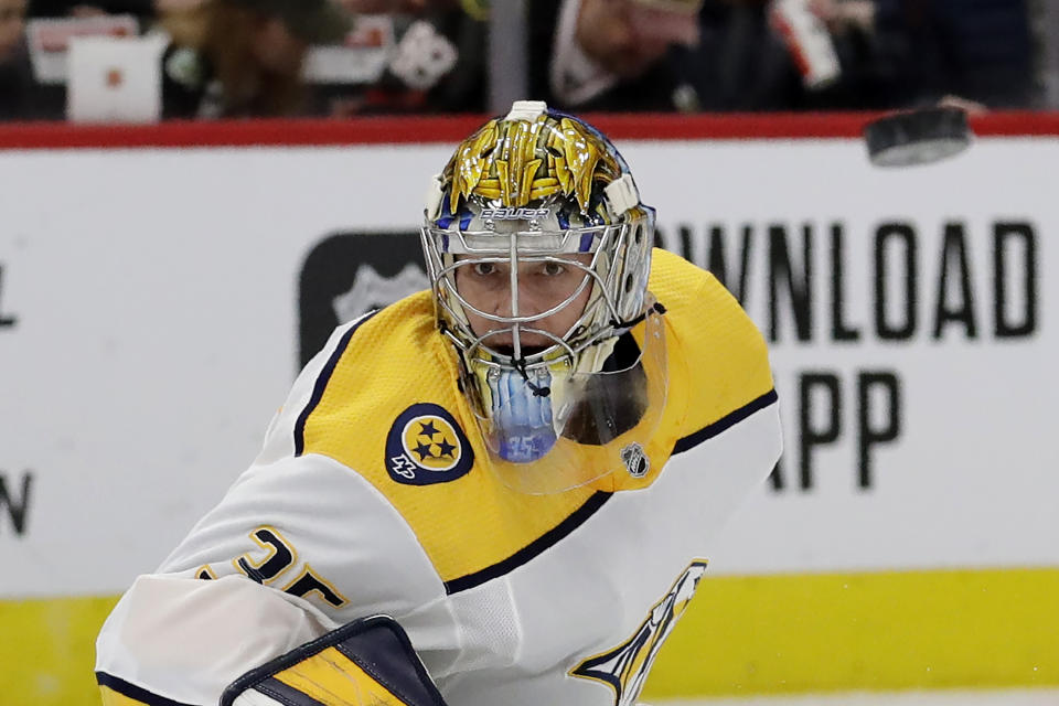 Nashville Predators goalie Pekka Rinne waits for the puck during the first period of an NHL hockey game against the Chicago Blackhawks in Chicago, Friday, Feb. 21, 2020. (AP Photo/Nam Y. Huh)