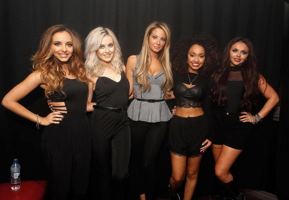 LONDON, UNITED KINGDOM - NOVEMBER 09: Jade Thirlwall, Perrie Edwards, Tulisa Contostavios, Leigh Anne Pinnock and Jesy Nelson of Little Mix pose backstage at Heaven on November 9, 2013 in London, United Kingdom. (Photo by Jo Hale/Redferns via Getty Images)