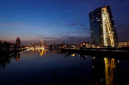 FILE PHOTO - The headquarters of the European Central Bank (ECB) and the Frankfurt skyline with its financial district are photographed on early evening in Frankfurt, Germany, March 25, 2018. REUTERS/Kai Pfaffenbach