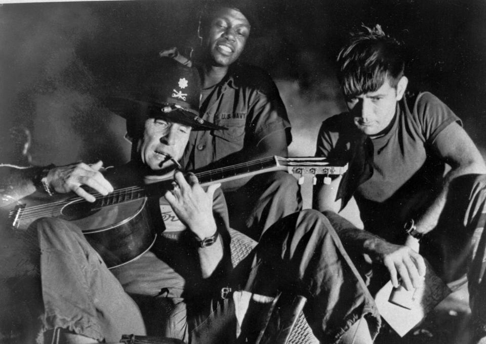 FILE - In this undated file photo released by United Artists, from left, Robert Duvall as Lt. Col. Kilgore, Albert Hall as Chief and Martin Sheen as Capt. Willard, are shown in the film "Apocalypse Now," a United Artists release. In 2001 director Francis Ford Coppola released "Apocalypse Now Redux," a new version of 1979 classic that adds 53 minutes of previously unseen footage. (AP Photo/United Artists, File)