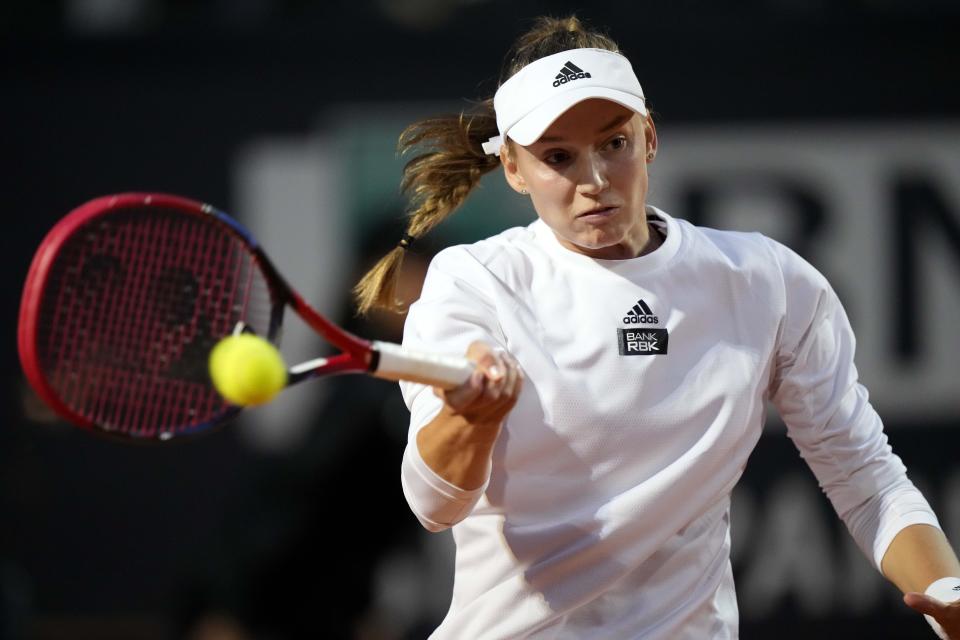 FILE - Kazakhstan's Elena Rybakina returns the ball during a semi final match against Latvia's Jeļena Ostapenko at the Italian Open tennis tournament in Rome, Italy, Friday, May 19, 2023. Play begins at the French Open on Sunday, May 28, 2023. (AP Photo/Andrew Medichini, File)