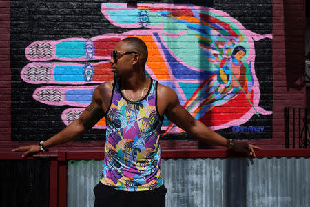 Justin Bonhomme, a government contract worker, poses for a portrait in the Brooklyn borough of New York, U.S., September 2, 2018. Bonhomme said. REUTERS/Caitlin Ochs