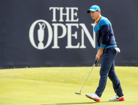 Jul 12, 2016; Ayrshire, SCT; Rory McIlroy (NI) putts on the 18th green during a practice round for the 145th Open Championship golf tournament at Royal Troon Golf Club - Old Course. Mandatory Credit: Ian Rutherford-USA TODAY Sports