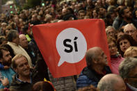 <p>Pro independence supporter hods up a banner reading, ”Yes” during a rally in support for the secession of the Catalonia region from Spain, in Bilbao, northern Spain, Saturday, Sept. 16, 2017. (Photo: Alvaro Barrientos/AP) </p>