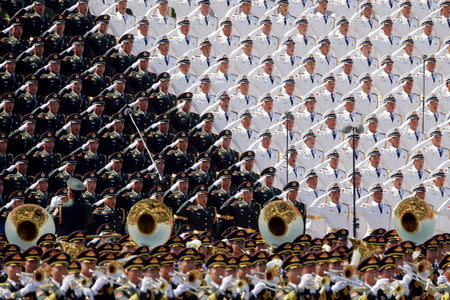 Military band sing and salute at the Tiananmen Square at the beginning of the military parade marking the 70th anniversary of the end of World War Two, in Beijing, China, September 3, 2015. REUTERS/Damir Sagolj