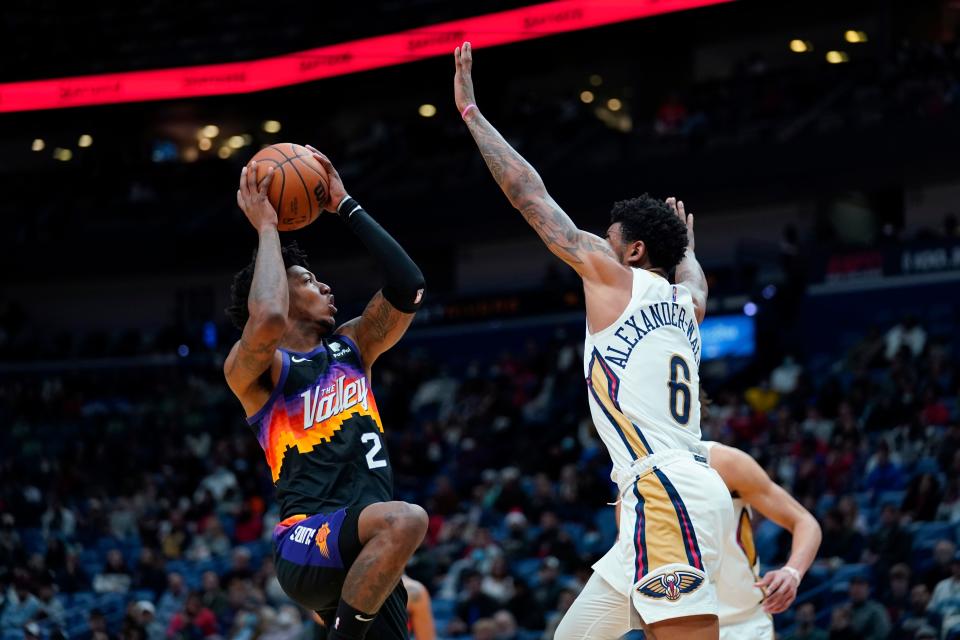Phoenix Suns guard Elfrid Payton (2) goes to the basket against New Orleans Pelicans guard Nickeil Alexander-Walker (6) in the second half of an NBA basketball game in New Orleans, Tuesday, Jan. 4, 2022. The Suns won 123-110.