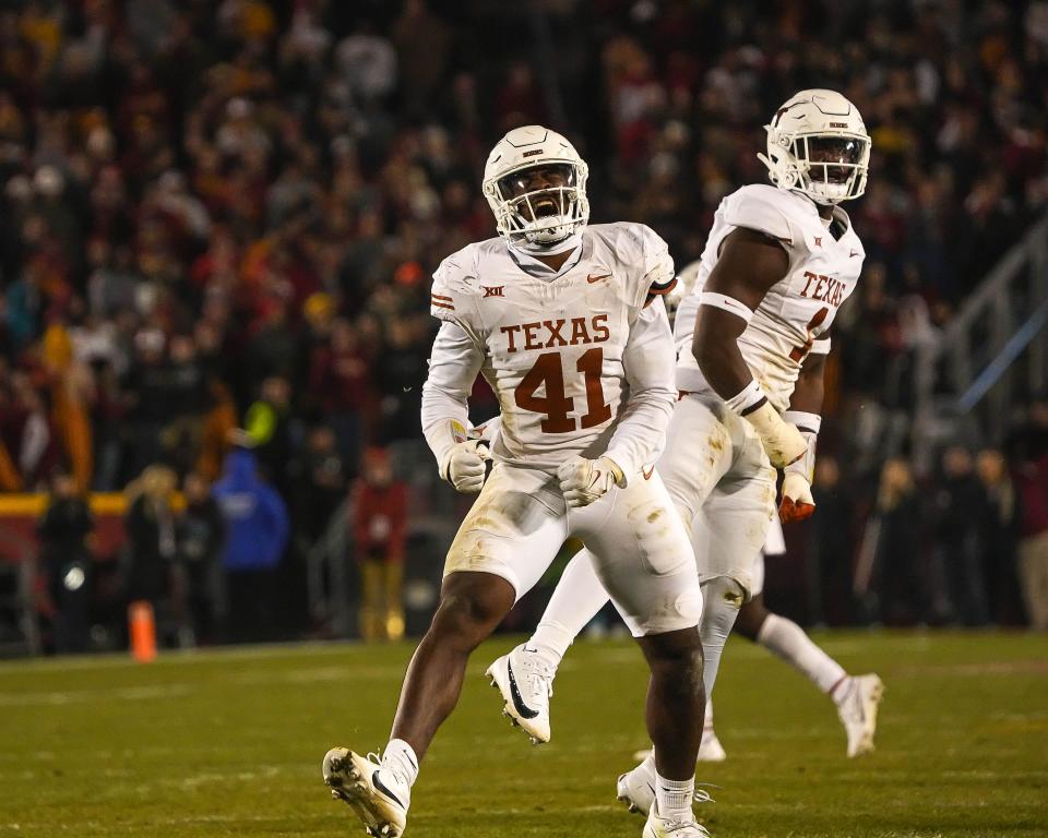 Texas Longhorns linebacker Jaylan Ford (41) celebrates a defensive stop during the game against the Iowa State Cyclones at Jack Trice Stadium on Saturday, Nov. 8, 2023 in Ames, Iowa.