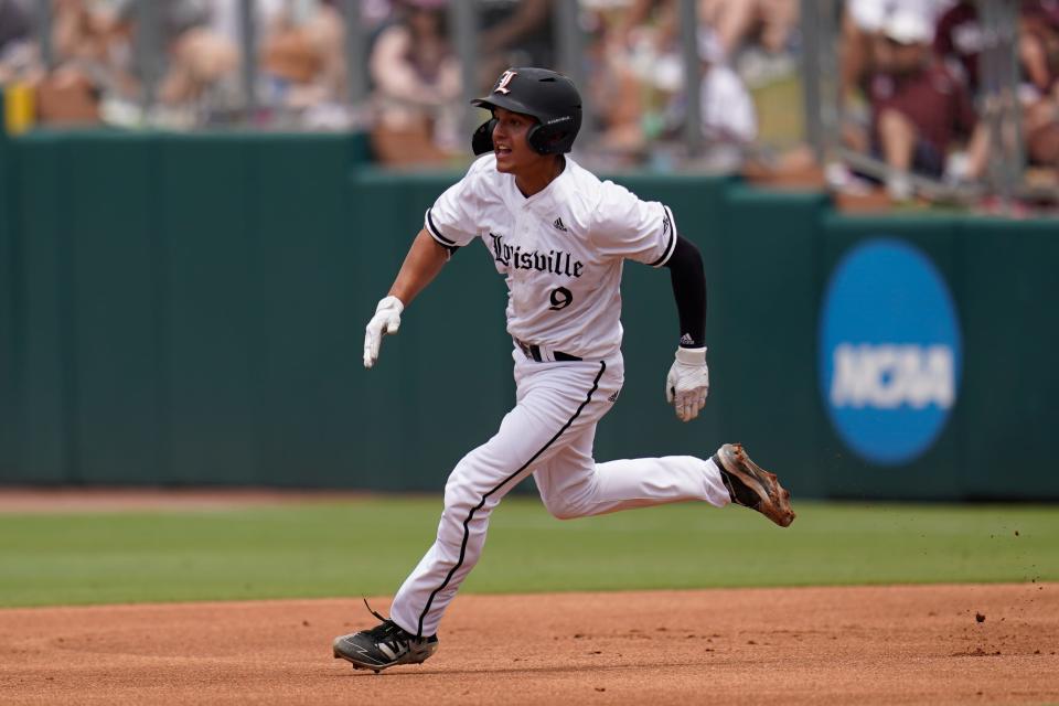 Jun 11, 2022; College Station, TX, USA;  Louisville infielder Christian Knapczyk (9) hits a double during the first inning against Texas A&M at Blue Bell Park. Mandatory Credit: Chris Jones-USA TODAY Sports