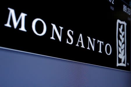 FILE PHOTO: Monsanto is displayed on a screen where the stock is traded on the floor of the New York Stock Exchange (NYSE) in New York City, U.S. on May 9, 2016. REUTERS/Brendan McDermid/File Photo