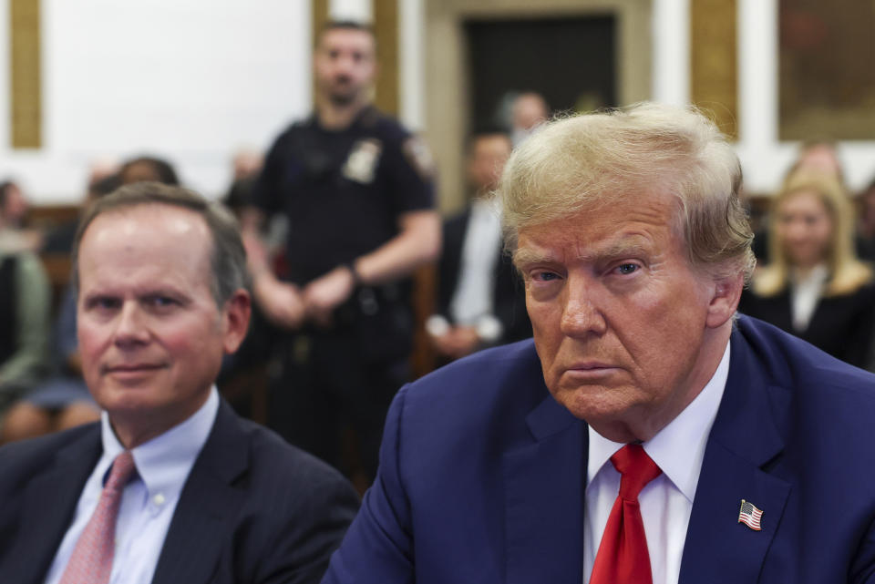 Former U.S. President Donald Trump and lawyer Christopher Kise attend the closing arguments in the Trump Organization civil fraud trial at New York State Supreme Court in the Manhattan borough of New York, Thursday, Jan. 11, 2024. (Shannon Stapleton/Pool Photo via AP)