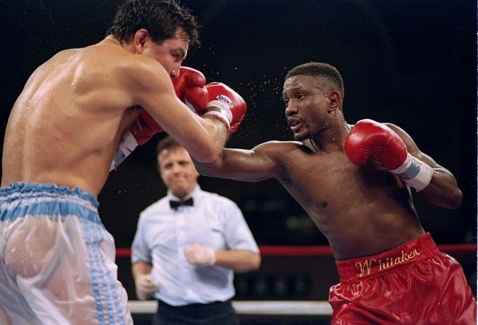 3 Apr 1995: Pernell Whitaker throws a punch at Julio Cezar Vasquez during a fight. Mandatory Credit: Simon Bruty /Allsport