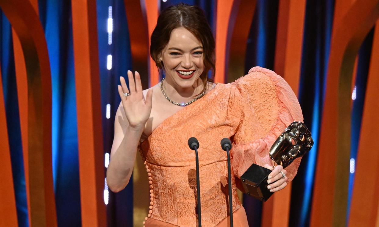 <span>Stone’s dress with a balloon-shaped sleeve took the Louis Vuitton atelier 450 hours to create.</span><span>Photograph: Kate Green/Bafta/Getty Images for Bafta</span>