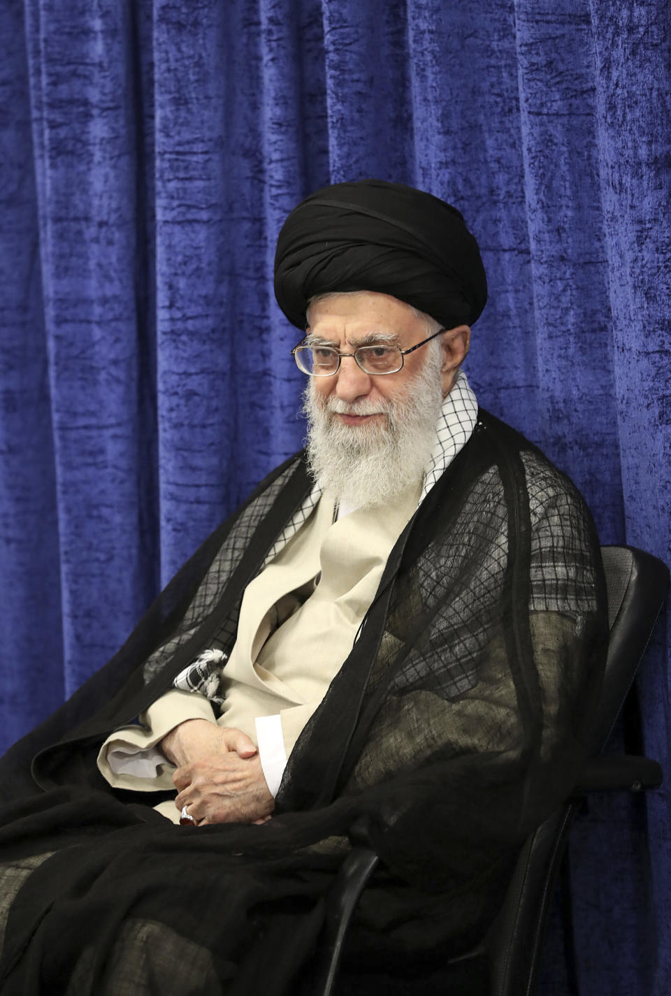 In this picture released by the official website of the office of the Iranian supreme leader, Supreme Leader Ayatollah Ali Khamenei attends a meeting with governmental officials in Tehran, Iran, Tuesday, May 14, 2019. Khamenei said his country won't negotiate with the United States and there will be no war between the two countries. (Office of the Iranian Supreme Leader via AP)
