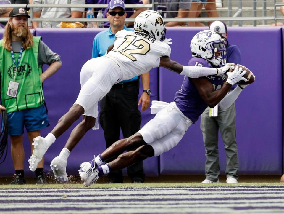 Colorado corner back Travis Hunter (12) defends TCU wide receiver Jaylon Robinson (13) in the end zone in the first half of a NCAA football game at Amon G. Carter Stadium in Fort Worth,Texas, Saturday Sept. 02, 2023. Colorado led 17-14 at the half. (Special to the Star-Telegram Bob Booth)