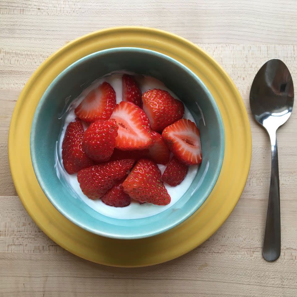 <p>Protein-rich Greek yogurt and sweet strawberries make for a super-simple and satisfying snack. <a href="https://www.eatingwell.com/recipe/261612/greek-yogurt-with-strawberries/" rel="nofollow noopener" target="_blank" data-ylk="slk:View Recipe;elm:context_link;itc:0;sec:content-canvas" class="link ">View Recipe</a></p>