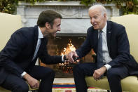 President Joe Biden meets with French President Emmanuel Macron in the Oval Office of the White House in Washington, Thursday, Dec. 1, 2022, during a State Visit. (AP Photo/Andrew Harnik)