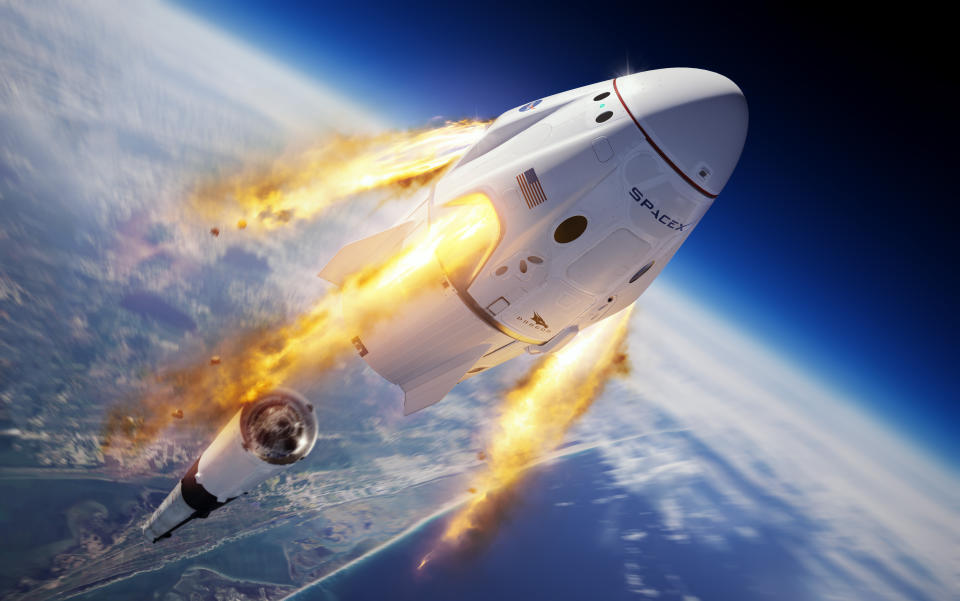 This illustration made available by SpaceX depicts the company's Crew Dragon capsule and Falcon 9 rocket during the uncrewed In-Flight Abort Test for NASA's Commercial Crew Program. (SpaceX via AP)