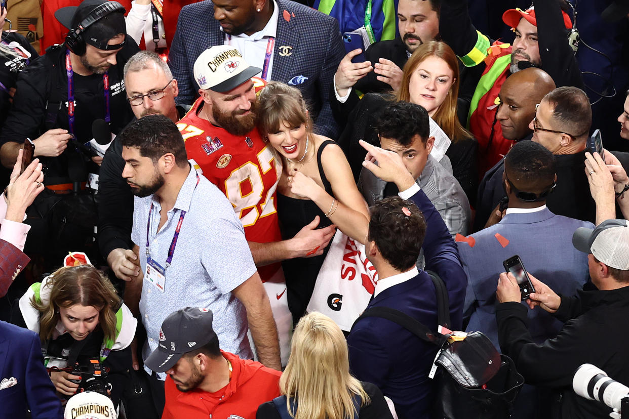 Kelce and Swift on the field. (Tim Nwachukwu/Getty Images)