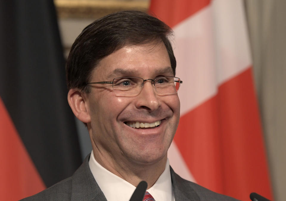 U.S. Secretary for Defense Mark Esper speaks during a press conference on the first day of the Munich Security Conference in Munich, Germany, Friday, Feb. 14, 2020. (AP Photo/Jens Meyer)b