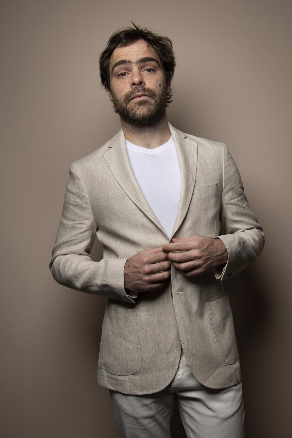 Juan Pedro Lanzani poses for portraits to promote the film "Argentina, 1985" during the 79th edition of the Venice Film Festival in Venice, Italy, on Sept. 4, 2022. (Photo by Vianney Le Caer/Invision/AP)