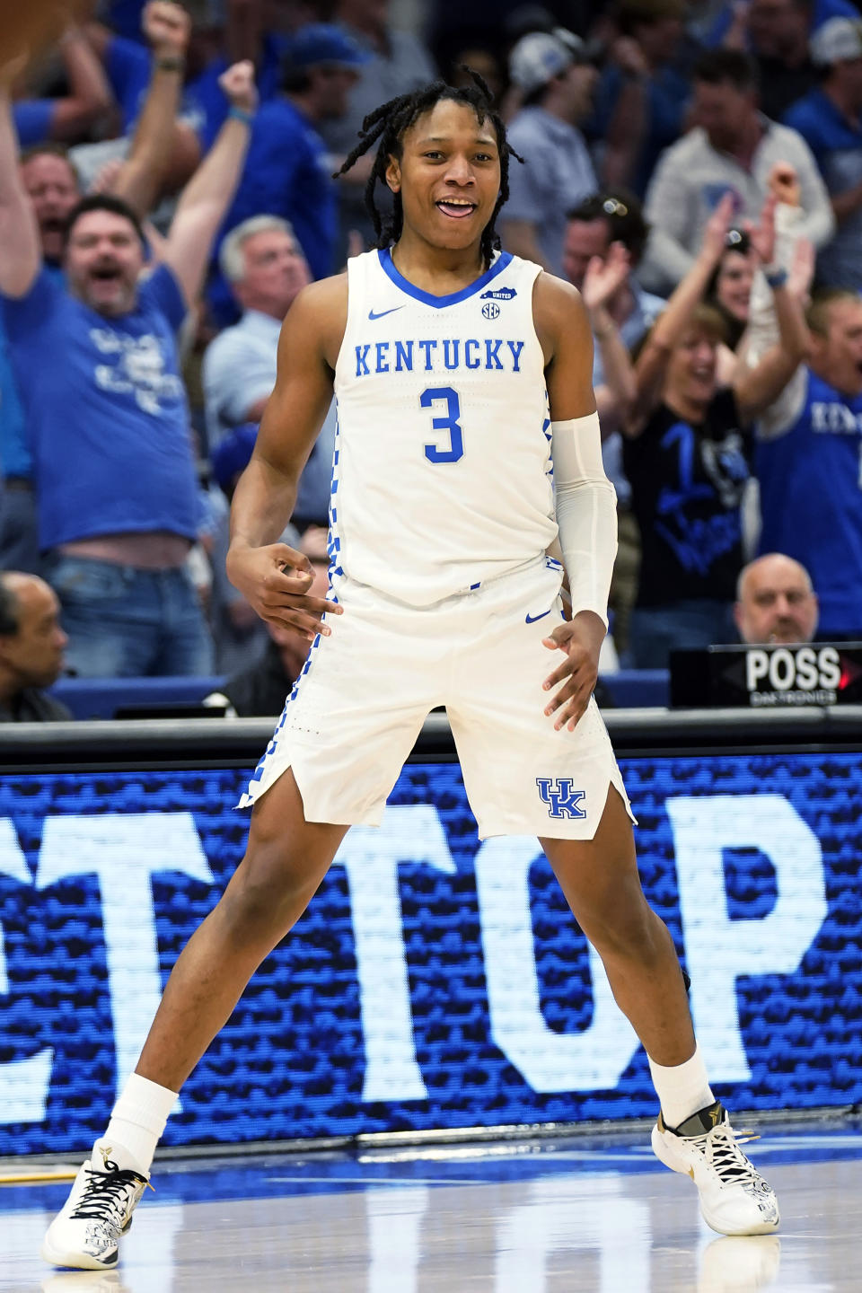 Kentucky guard TyTy Washington Jr. (3) reacts to a 3-point basket against Vanderbilt during the second half of an NCAA college basketball game in the Southeastern Conference men's tournament Friday, March 11, 2022, in Tampa, Fla. (AP Photo/Chris O'Meara)