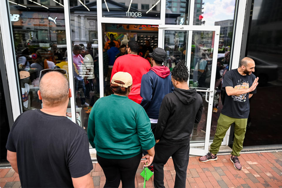 Customers line up for the grand reopening of The Athlete’s Foot in Atlantic Station, in midtown Atlanta, in April 2023. - Credit: Courtesy of The Athlete's Foot