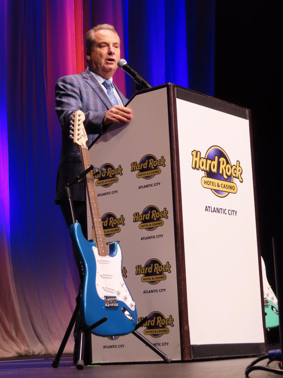 Jim Allen, chairman of Hard Rock International, speaks at an employee meeting at the Hard Rock casino in Atlantic City, N.J., on Feb. 17, 2022. On Sept. 12, 2022, Hard Rock announced it is spending over $100 million to give significant raises to 10,000 non-tipped workers, most of them in the U.S. (AP Photo/Wayne Parry)