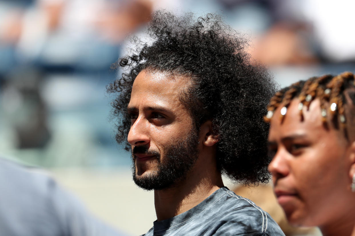 Colin Kaepernick watched Naomi Osaka play at the US Open on Thursday. (Photo by Al Bello/Getty Images)