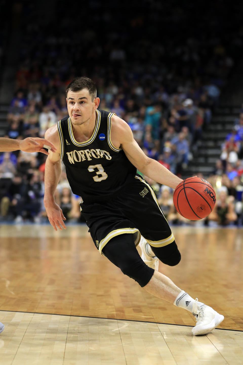 <p>Fletcher Magee #3 of the Wofford Terriers drives against the Kentucky Wildcats during the first half of the game in the second round of the 2019 NCAA Men’s Basketball Tournament at Vystar Memorial Arena on March 23, 2019 in Jacksonville, Florida. (Photo by Mike Ehrmann/Getty Images) </p>