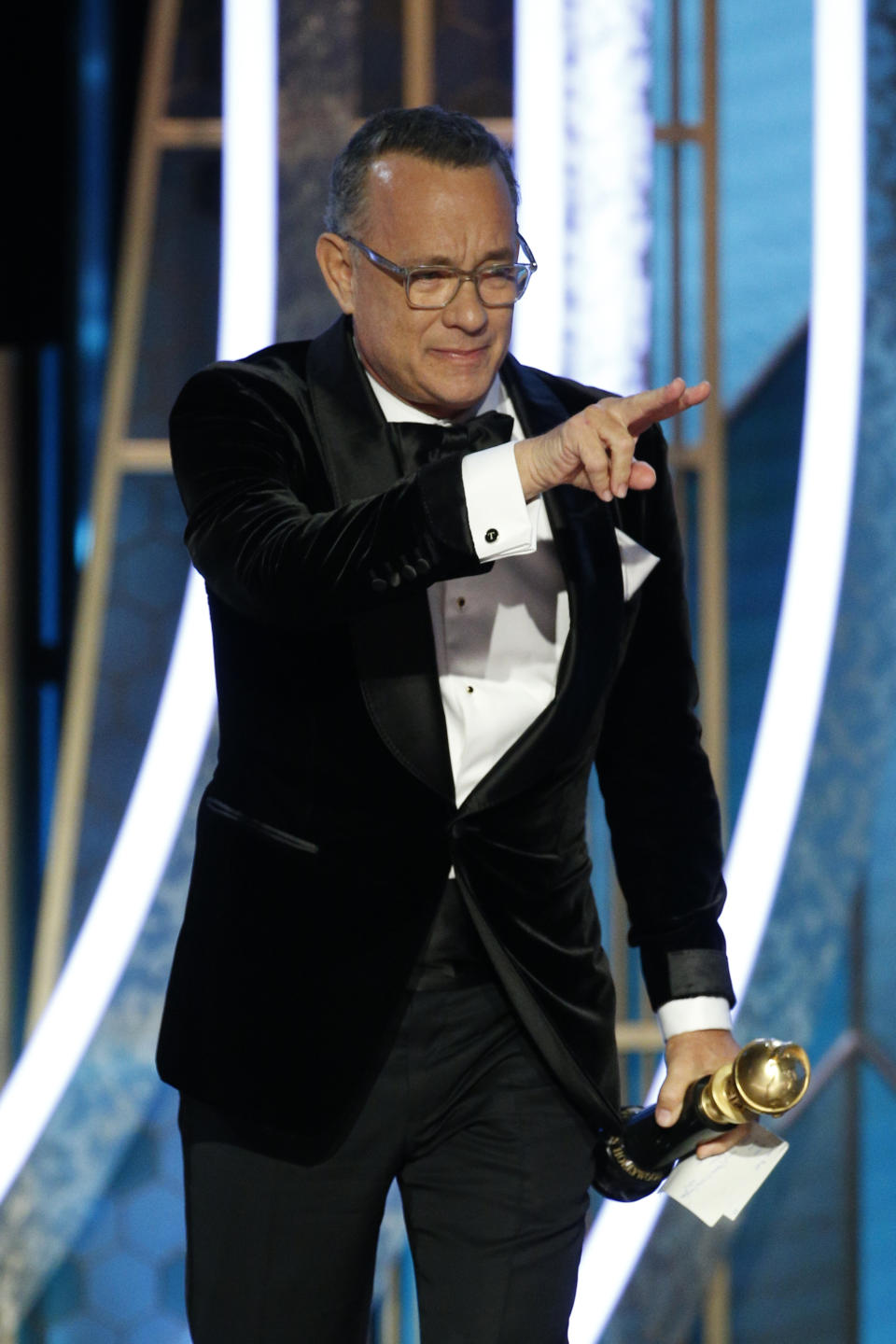 BEVERLY HILLS, CALIFORNIA - JANUARY 05: In this handout photo provided by NBCUniversal Media, LLC,  Tom Hanks accepts the CECIL B. DEMILLE AWARD onstage during the 77th Annual Golden Globe Awards at The Beverly Hilton Hotel on January 5, 2020 in Beverly Hills, California. (Photo by Paul Drinkwater/NBCUniversal Media, LLC via Getty Images)