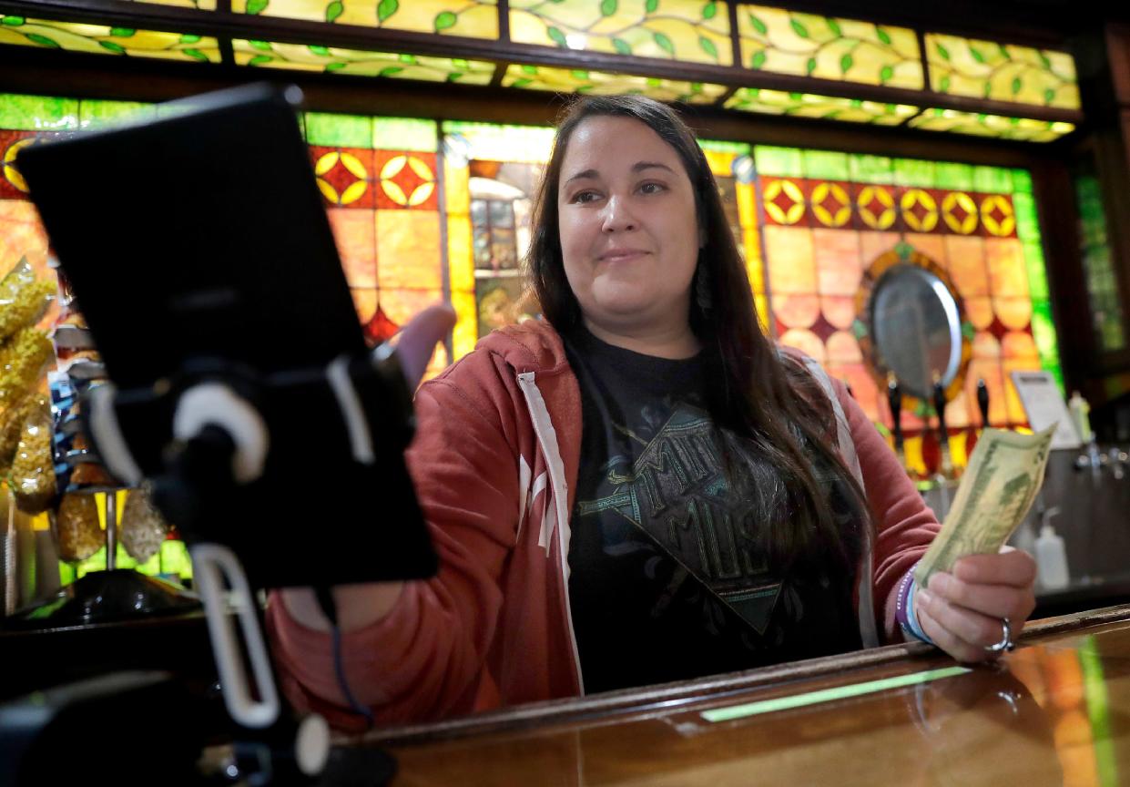 Taproom and events manager Jess Grim rings up an order at McFleshman's Brewing Co. on Thursday, October 13, 2022 in Appleton, Wis. Starting Friday, Feb. 23, 2024, McFleshman’s will change its tipping policy, according to the co-owners.