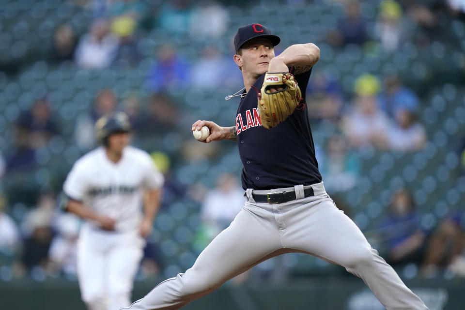 Cleveland Indians starting pitcher Zach Plesac throws against to a Seattle Mariners batter during the first inning of a baseball game Thursday, May 13, 2021, in Seattle. (AP Photo/Elaine Thompson)